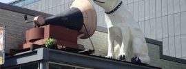 Sculpture of the old RCA dog listening to a phonograph horn