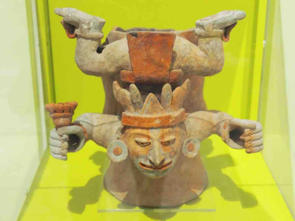 Mayan Sculpture of Man upside down resting on his chest