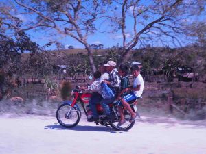 Motorcycle with five people on the seat