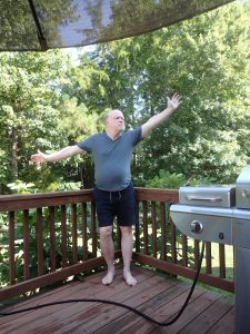 author in victory pose