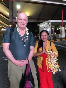 author and lady with leis