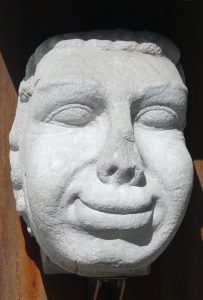 Smiling face sculpture