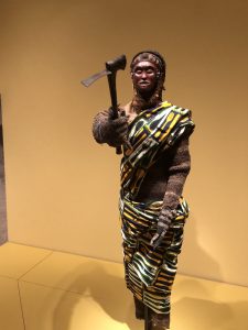 African statue with axe