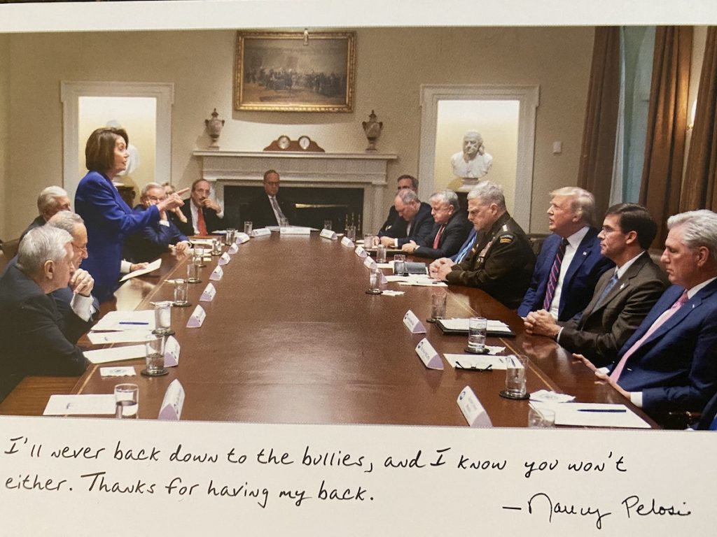 Nancy Pelosi confronting Donald Trump