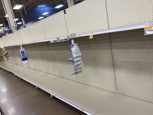 empty shelves where toilet paper was